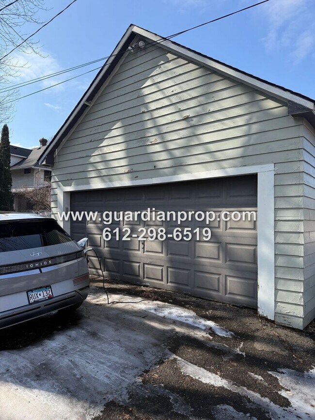 Building Photo - Merriam Park House Available May 1st, Updated Kitchen, Office, Fenced Yard, 2 Car Garage