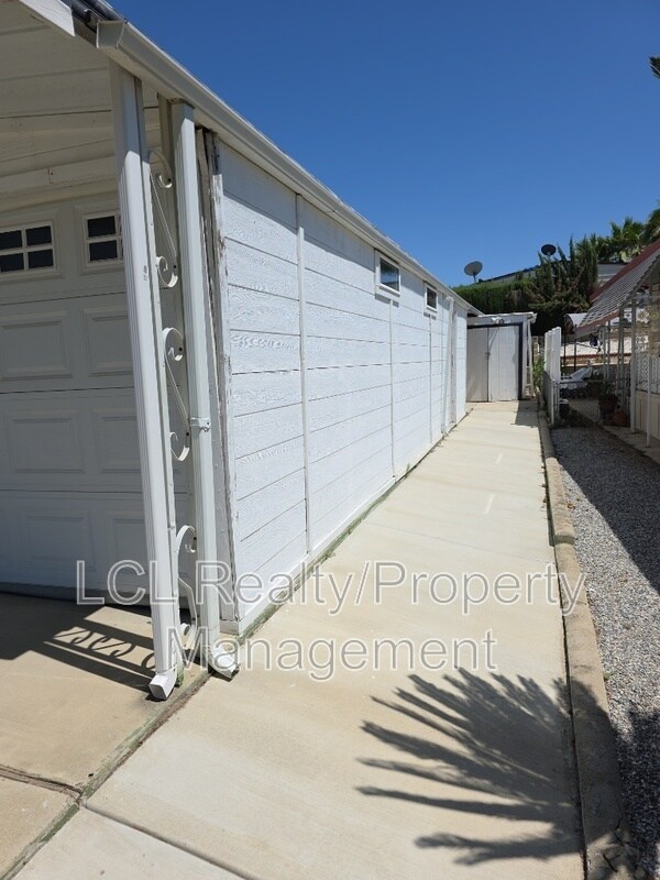 Building Photo - 30715 Arenga Palm Dr