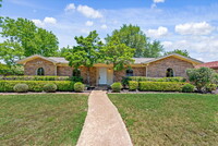 Building Photo - "Spacious 4-Bedroom Hardwood & Granite Fin...