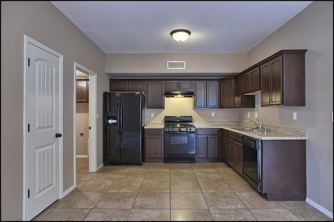Building Photo - 14302 Pancho Gonzalez Ct