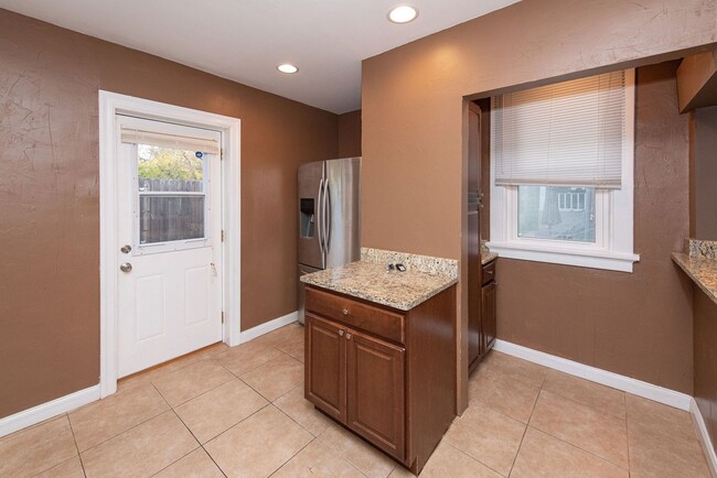 Building Photo - NORWOOD-  UNIT #1, 2+ bedroom 1.5 BATH W/ GARAGE /OVERSIZED YARD/DECK