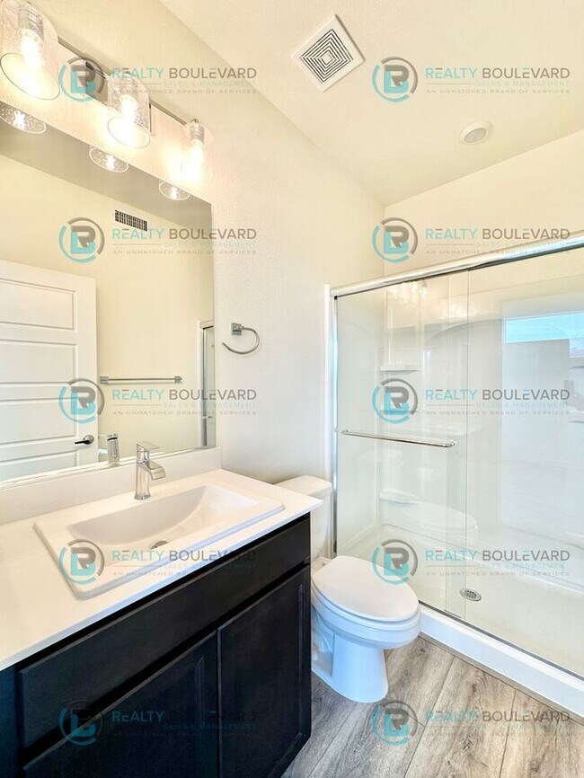 Building Photo - Modern 2 Bedroom 2Bath Townhome with Dual Patios & Designer Finishes near Truckee River