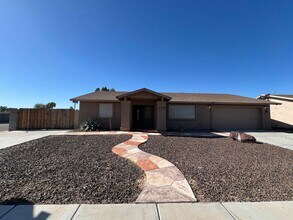 Building Photo - 4 BEDROOM POOL & SOLAR HOME!