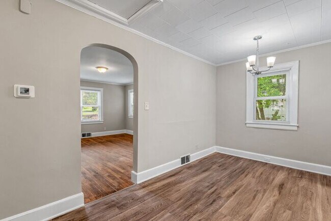 Building Photo - Adorable Home, Just Painted, Wood Flooring...