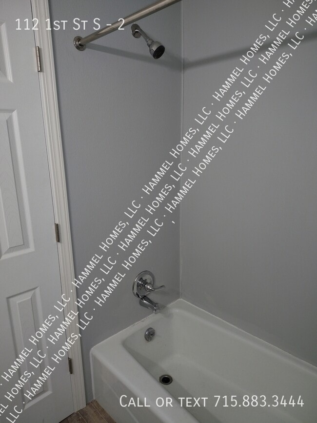 Building Photo - 112 1st St S