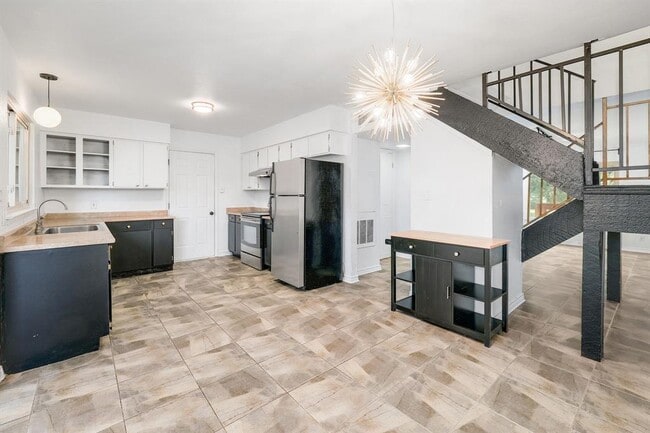 Building Photo - 9534 Quail Village Ln