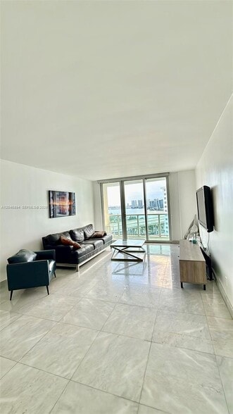 Building Photo - 19380 Collins Ave