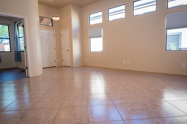 Building Photo - Gorgeous 3 Bedroom 2 Bathroom Home with Tile Throughout! Central A/C, 2 Car Garage!