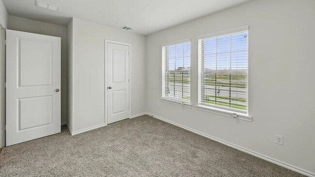 Building Photo - Beautiful new 4-bedroom, 2-bath home with an open floor plan, granite kitchen, two-car garage, an...