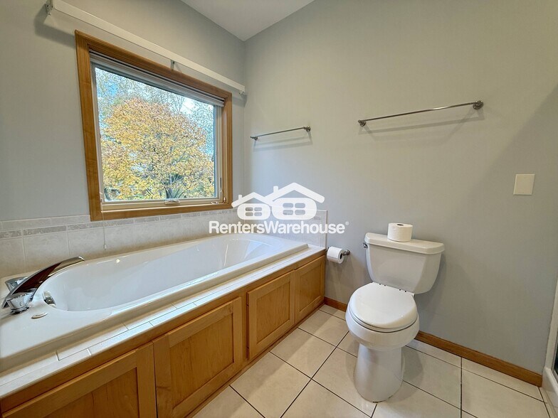 Building Photo - 9536 Windflower Pl N