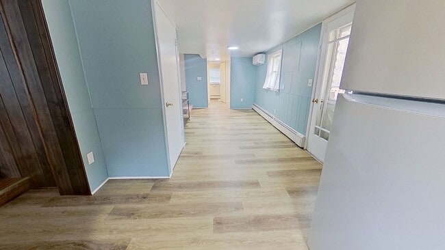 Building Photo - Bright & Cozy Second-Floor Apartment