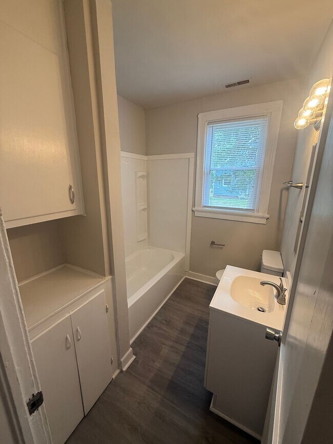 Building Photo - 2-bedroom 1 bathroom Cottage on a large lot with 2 large storage building on site