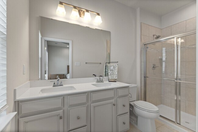 Building Photo - Luxurious three-story townhome with owner's suite and high-end finishes