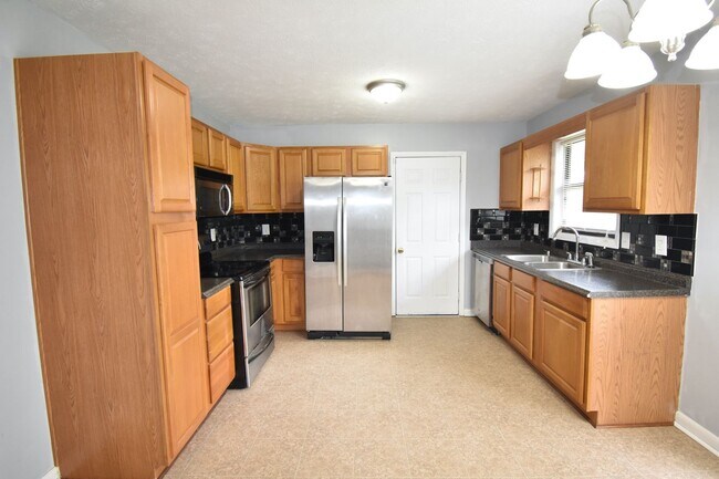 Building Photo - 6897 Kingsgate Dr