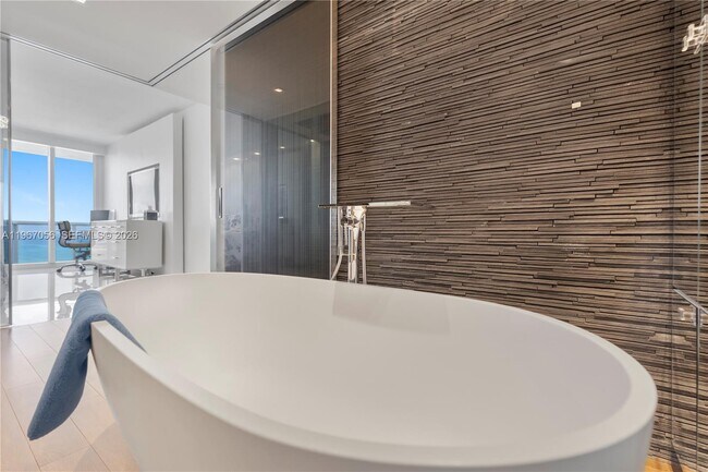 Building Photo - 4779 Collins Ave