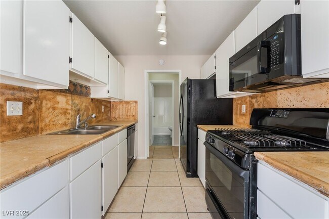 Building Photo - 5453 Requa Ave