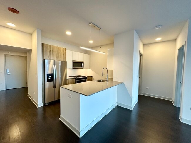 Building Photo - 313 W Wolf Point Plaza