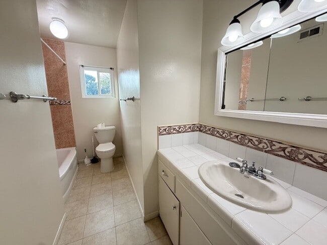 Building Photo - College View Estates Gem – Spacious 3BR Home with Private Yard & RV Parking