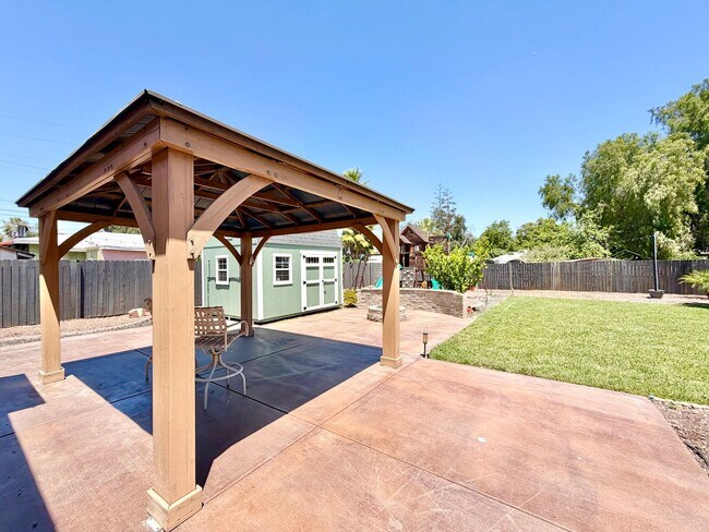 Building Photo - Beautifully Renovated 4 Bedroom Home with INCLUDED Solar, Large Backyard & Gazebo