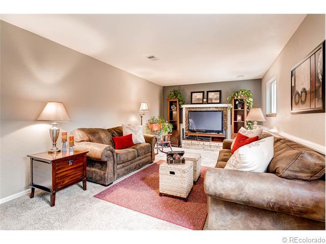 large family room for family get togethers now with electric fireplace and marble surround - 7091 Beech Street