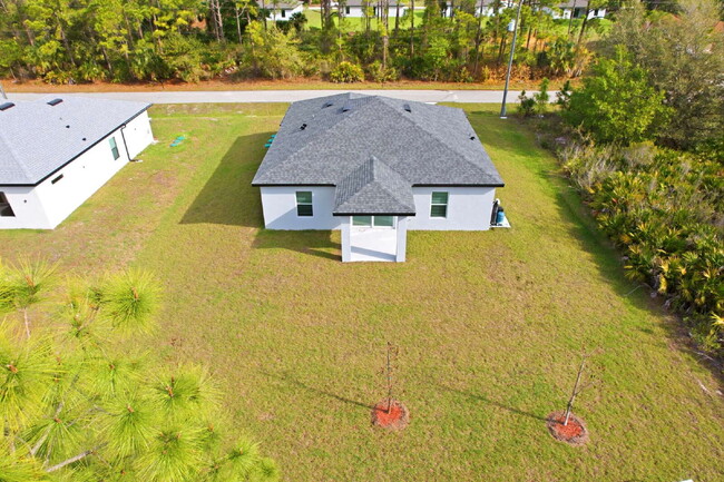 Building Photo - Brand New 4-Bedroom Gem with 2 Full Baths on Large Lot in Lehigh Acres – A Perfect Family Haven!
