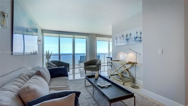 Building Photo - 3 br, 2.5 bath Condo - 6365 Collins Ave Ov...