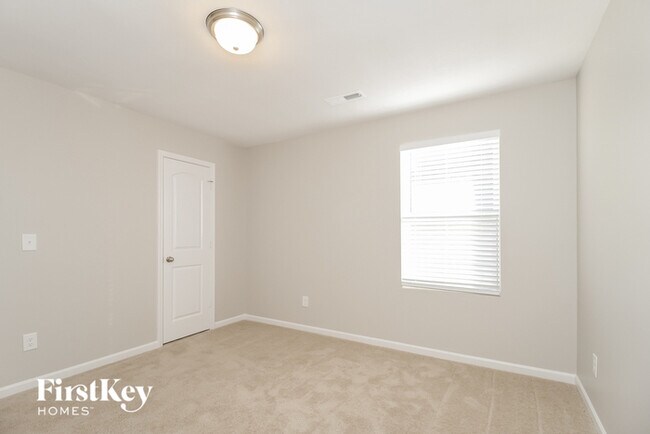 Building Photo - 4725 Tuliptree Dr