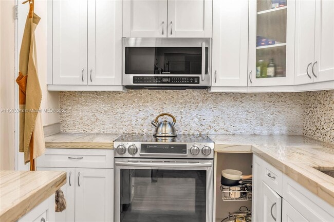 Building Photo - 10185 Collins Ave