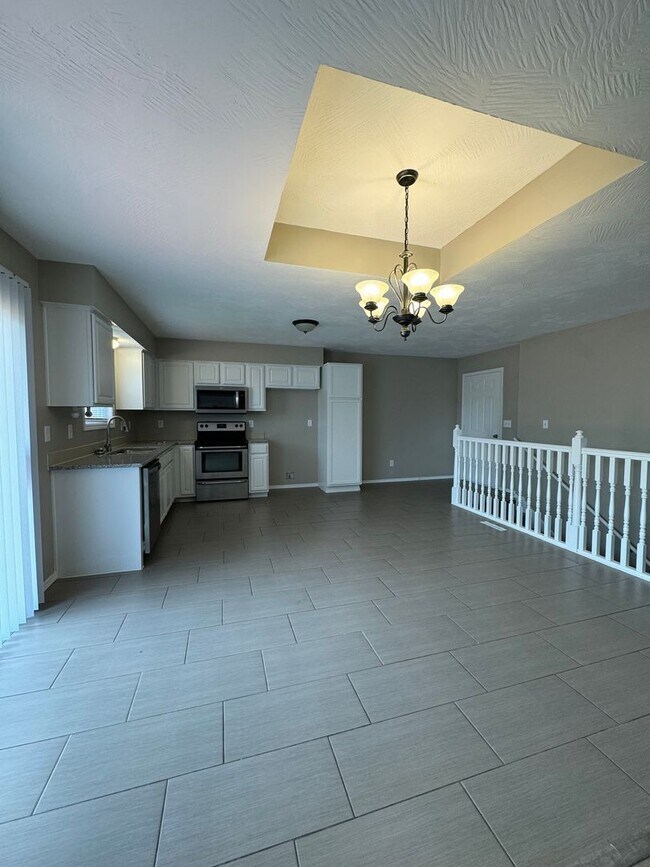 Building Photo - Beautiful Large corner lot 4 bedroom 3 full bathroom 2 car garage with 3 living rooms and much mo...