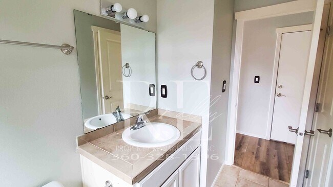 Building Photo - Modern Manette 1BR Condo with Private Pati...