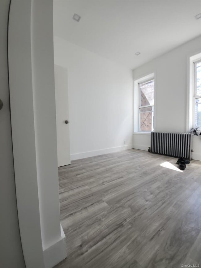 Building Photo - 60-80 54th Pl