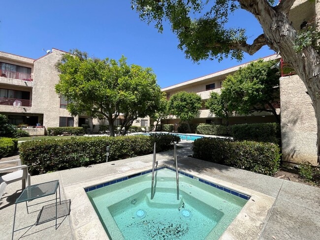 Building Photo - Canoga Park 2+1 w/pool + spa, gated entry + parking included!