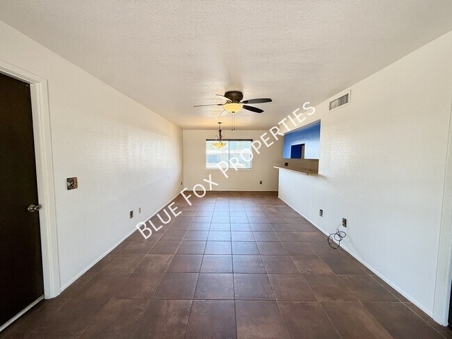 Building Photo - 7650 N Rasmussen Ave