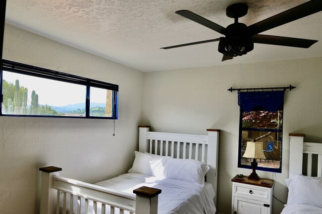 Building Photo - Garcia House: Fully Furnished, Wonderful Hot Tub, Spacious Fenced Outdoor Area, Pet-Friendly too!