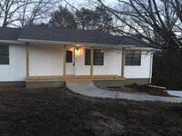 Building Photo - 4 Bedroom, 3 Bath Basement Ranch with Coun...