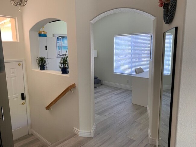 Building Photo - Partially Furnished 2/2 CONDO WITH  *BONUS DEN* & 2 CAR GARAGE!