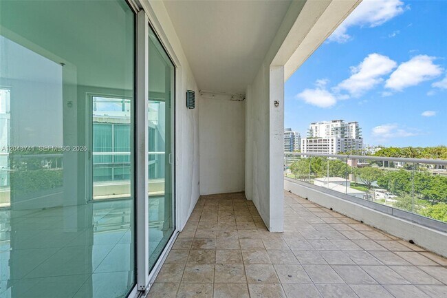 Building Photo - 6362 Collins Ave