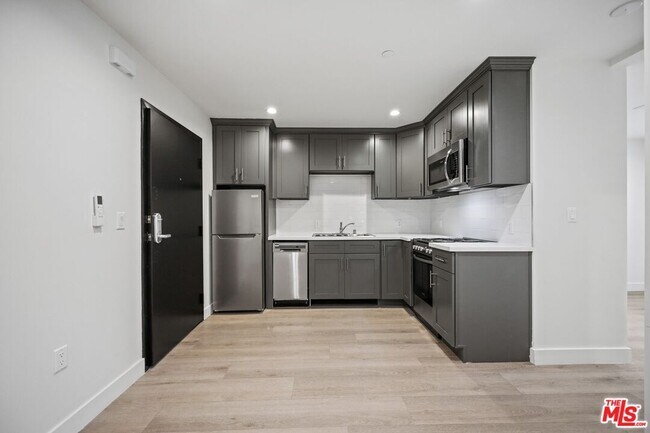 Building Photo - 1439 Armacost Ave