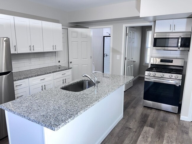 Building Photo - The Duplex on Plumer: Where Modern Meets M...