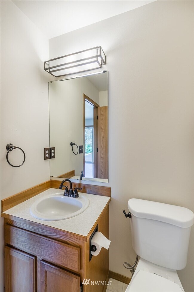 Downstairs half bath - 10205 7th Pl SE
