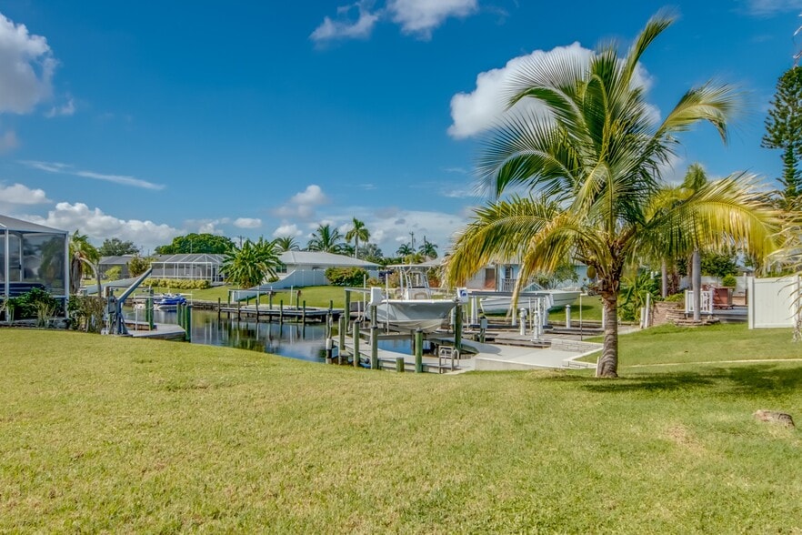 This is a corner canal lot with no dock, but you can fish from the backyard. - 2316 Everest Pky