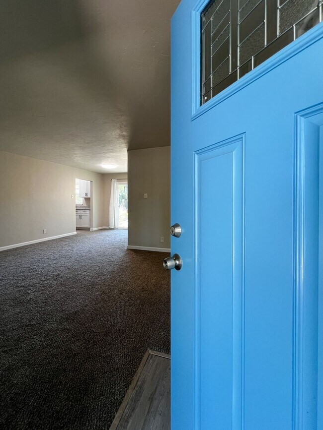 Building Photo - Freshly Renovated 3 Bedroom Home with Large Fenced Yard & Double Garage