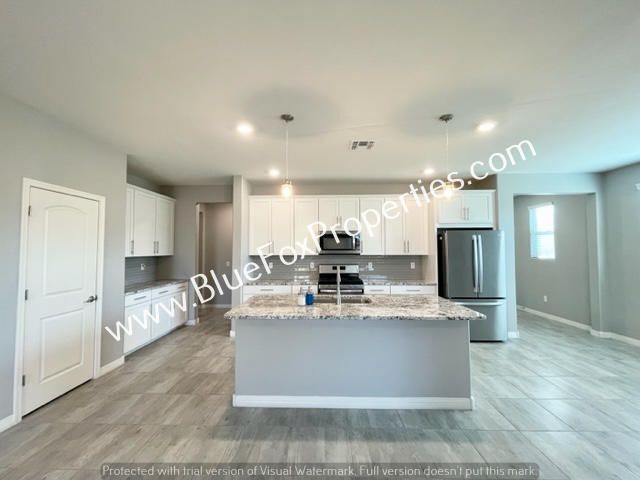 Building Photo - 8631 N Rome Ct