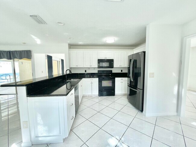 Building Photo - 10579 Pebble Cove Ln