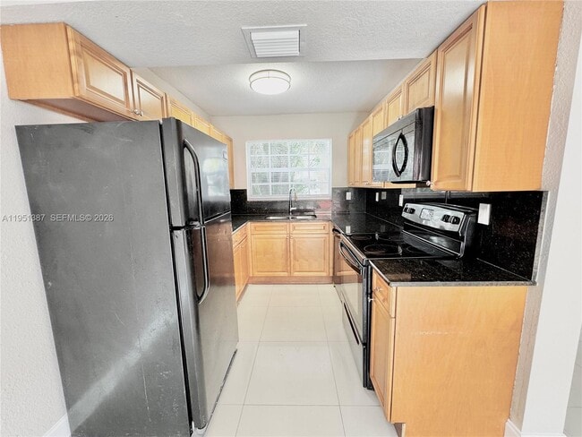 Building Photo - 3840 SW 52nd Ave