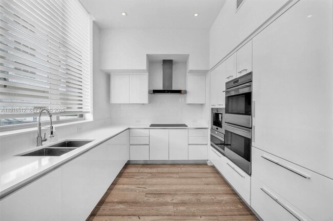 Building Photo - 9501 Collins Ave