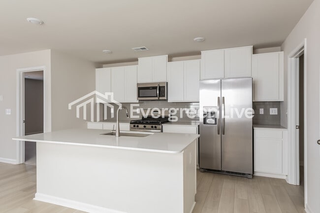 Building Photo - now