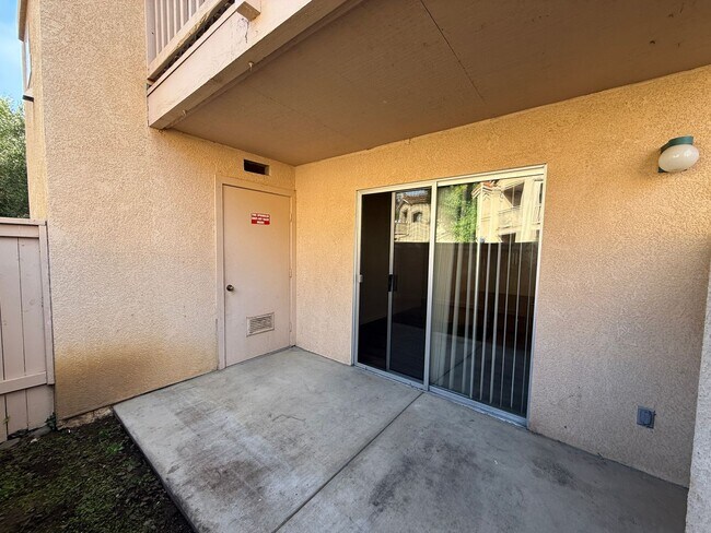Building Photo - Downstairs Corner Condo in the Gated Commu...