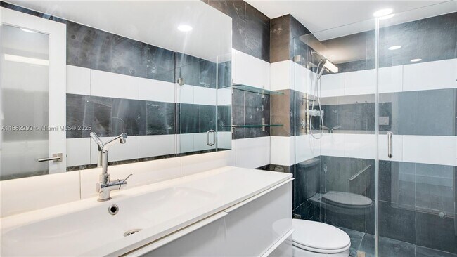 Building Photo - 5838 Collins Ave