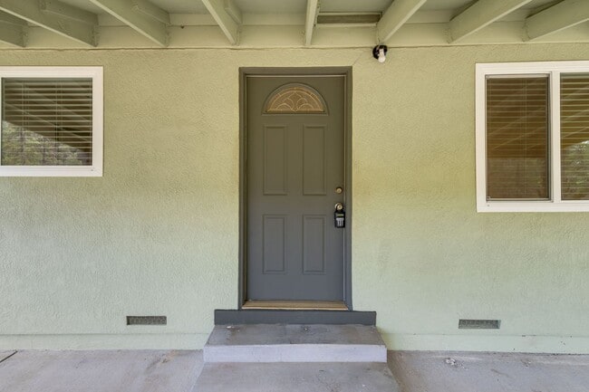Building Photo - Peaceful Country Living with Updated Bathroom and Covered Porch
